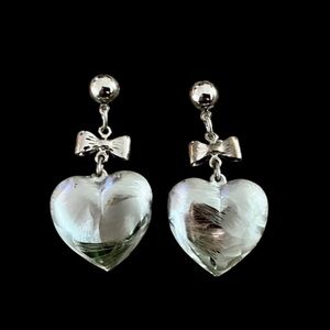 Elegant Silver Earrings with Heart Shaped Pendants and Sparkling Accents